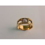 A banded agate ring, stamped 18ct, ring size N.