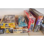 Eight boxed model kits Revell, Italeri, and Monogram.