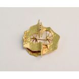 A hallmarked 9ct yellow gold open metalwork brooch, makers mark HH.