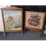 Two oak fire screens with tapestry panels.