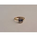 A blue and colourless stone ring, stamped 18ct, ring size M½