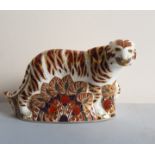 A Royal Crown Derby figure of a tiger.