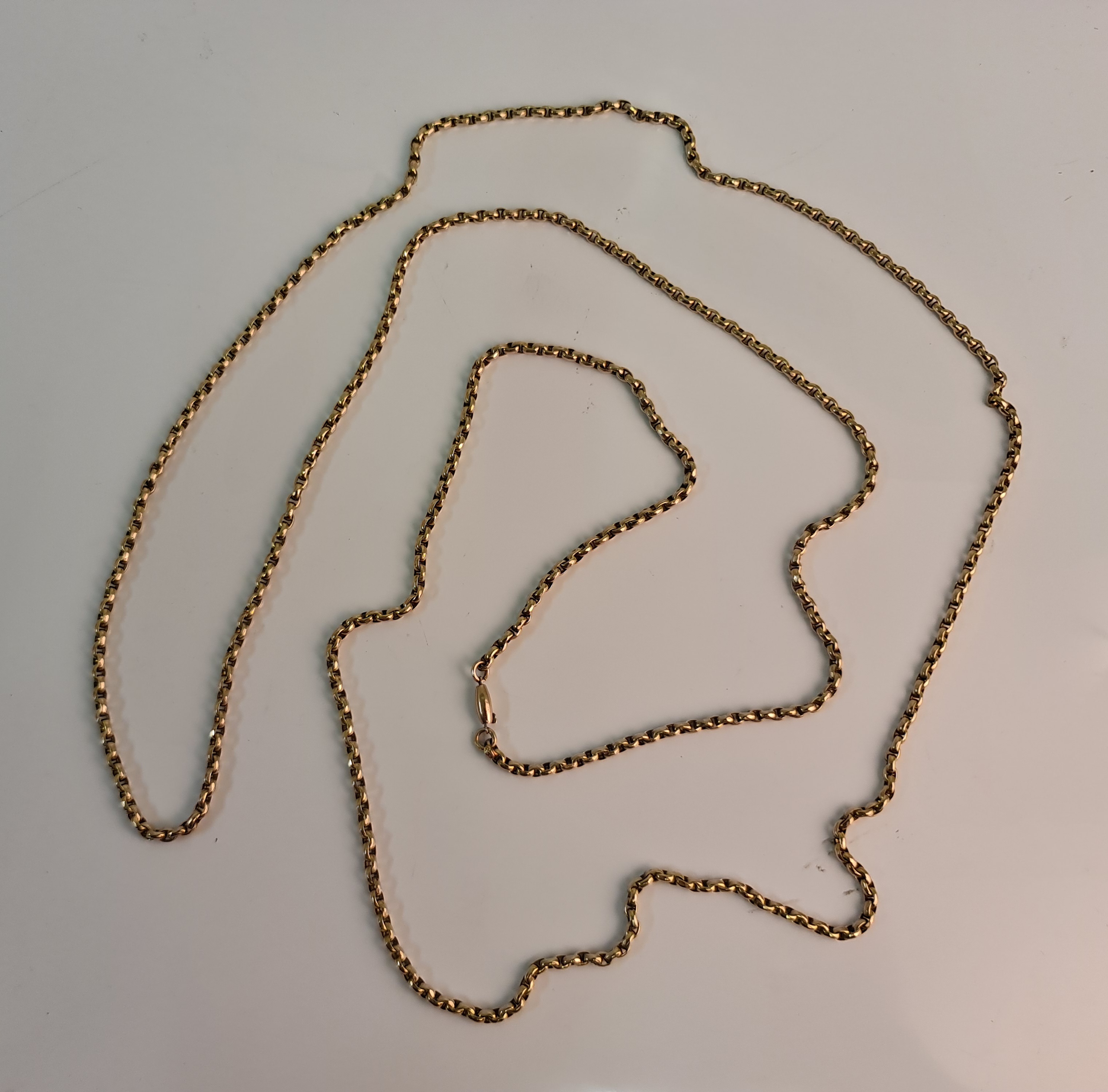 A belcher link guard chain, stamped 9ct, approx. length 144cm.