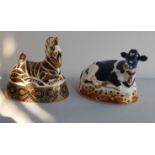 Two Royal Crown Derby figures cow and zebra.