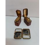 A small vesta case and a two piece travel inkwell and Vesta set.