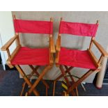 Two folding directors chairs - obe with words DON on back the other MALC.