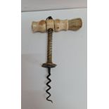 A bone 19th century English wine corkscrew.