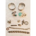 A collection of jewellery some assessed as silver to include, a textured bracelet, open work