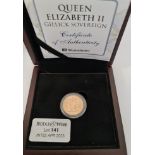 A boxed gold proof Sovereign dated 1957 - The Gillick Sovereign with Westminster mint paperwork.