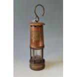 A E.Thomas & Williams copper and brass miners lamp.