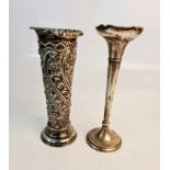 A hallmarked silver tapered flute vase, approx. height 20cms, approx. weight 138gm and a fluted