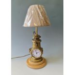 A converted Powell & Hanmer brass lamp, clock table light.