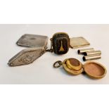 A pill box in form of a WWI tank, a sovereign holder, a pitch whistle, a miniature purse on chain