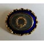 A 19th Century diamond, pearl, hardstone and enamel memorial brooch, the central buckle design set