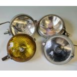 A pair of Joseph Lucas LR11 fog lamps with a LR6 and LR576 fog lamps.