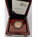 A boxed gold proof Sovereign 2019 with certificate 5632.
