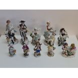 A group of ten German style figures.