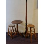 Two pine stools table and standard lamp.