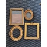 Four small picture frames, one approx 17cm x 24cm.