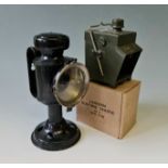 A WW2 T.E.Bladon & Son 1942 Candle lamp and a lantern electric traffic No.2 light.