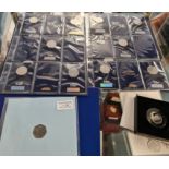 Two sheets of cupro nickel 50p coins including Kew Gardens, Roger Bannister, Girl Guides, Victoria