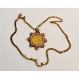 A mounted 1913 George V full sovereign on a hallmarked 9ct yellow gold link chain, approx. length