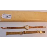 A Lady's wristwatch on bracelet strap, marked 14c 0.585 on back of case, with loose bracelet