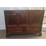 A early 19th century oak mule chest with two drawers.