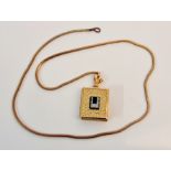 A decorative locket stamped 750 (on loop), approx. weight 8.2gms on chain approx.length 40cms