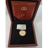 A boxed gold proof £1 coin marking Prince Philip 70 years of service.