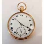 A hallmarked 9ct yellow gold cased crown wind open face pocket watch, the white enamel dial having