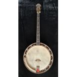 An Leedy solo tone banjo in case.