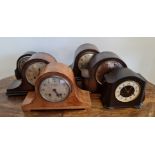 Six assorted mantle clocks.