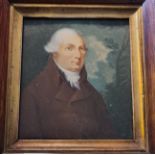 A 19th century portrait miniature on ivory of a Georgian gentleman with white hair in a brown coat