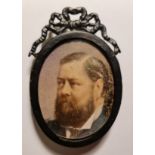 A late 19th century or early 20th century portrait miniature on ivory a gentleman with beard in oval