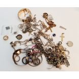 A collection of various jewellery to include brooches, bracelets, chains, a bangle, earrings,