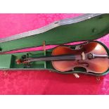 A 4/4 Czech Violin Copy of a Strad with carrying case.