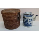 A 19th century Chinese blue and white teapot in basket A/F.