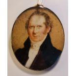 A Georgian portrait miniature on ivory of a gentleman in black jacket in gold oval frame - unmarked.