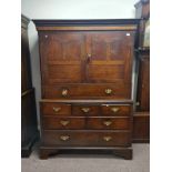 A 19th century cupboard on chest with drawers to base on bracket feet height 182 cm.