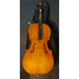 A cello in soft case with bow made in Hungary.
