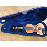 A Suzuki 1/2 size violin with carrying case.