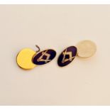 A pair of hallmarked 9ct yellow gold enamel Masonic cufflinks.