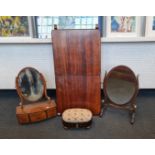 A 19th century mahogany campaign folding table together with a foot stool and two swing mirrors.