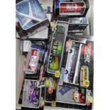 A box of Dickie diecast vehicles.