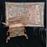 A arts and crafts copper hand beaten spirit kettle and matching tray.