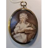 A 19th century portrait miniature on ivory of a seated lady resting on a plinth in silver coloured