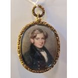 A 19th century portrait miniature on ivory gentleman in gilt metal oval frame with small hair locket