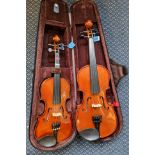 Two Stentor Student violins 1/4 and 1/2.