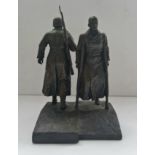 A bronze figure of Russian soldiers going and coming back signed and dated 1980 height 21 cm.